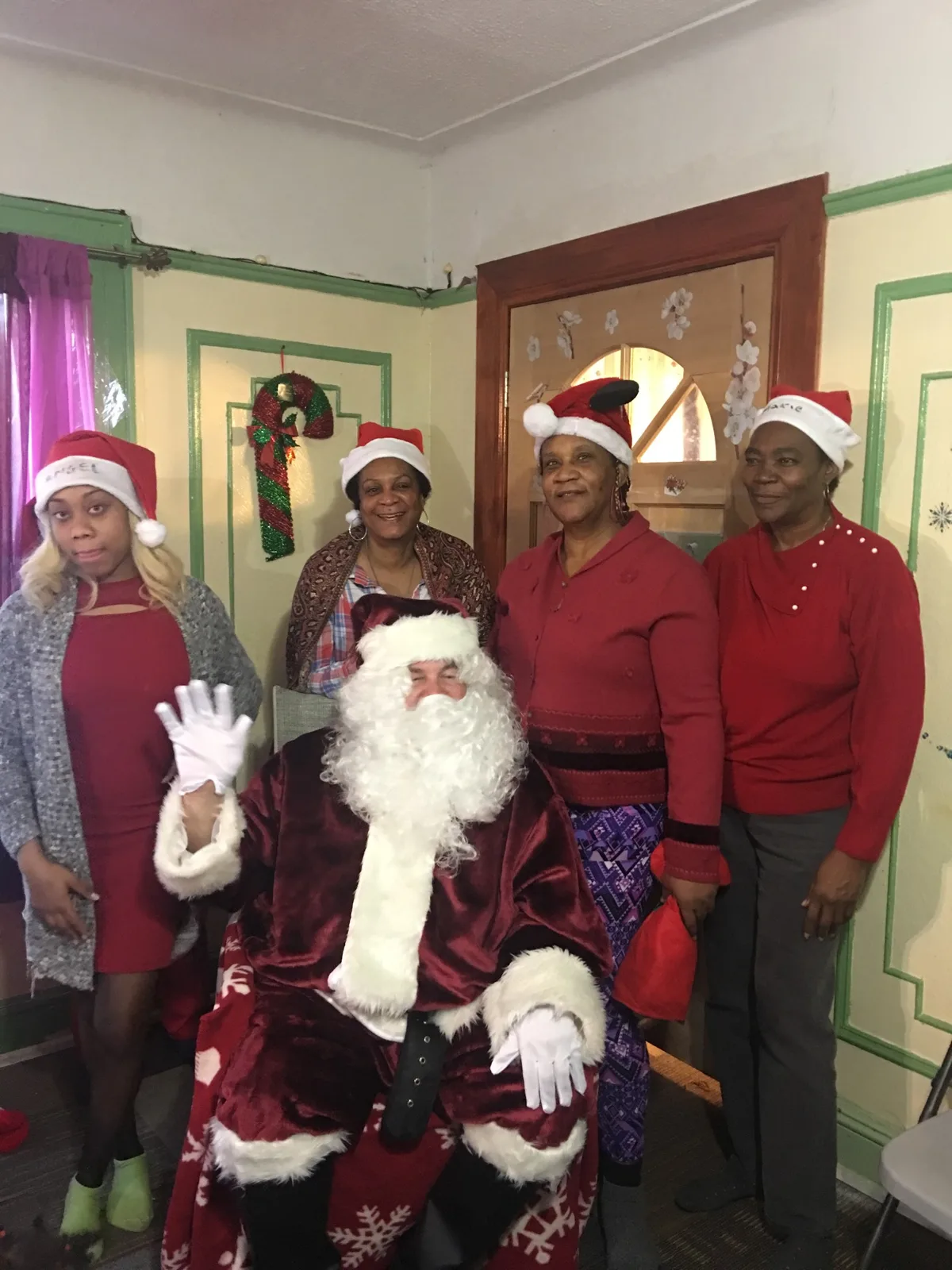 Past staff and helpers at a daycare holiday celebration