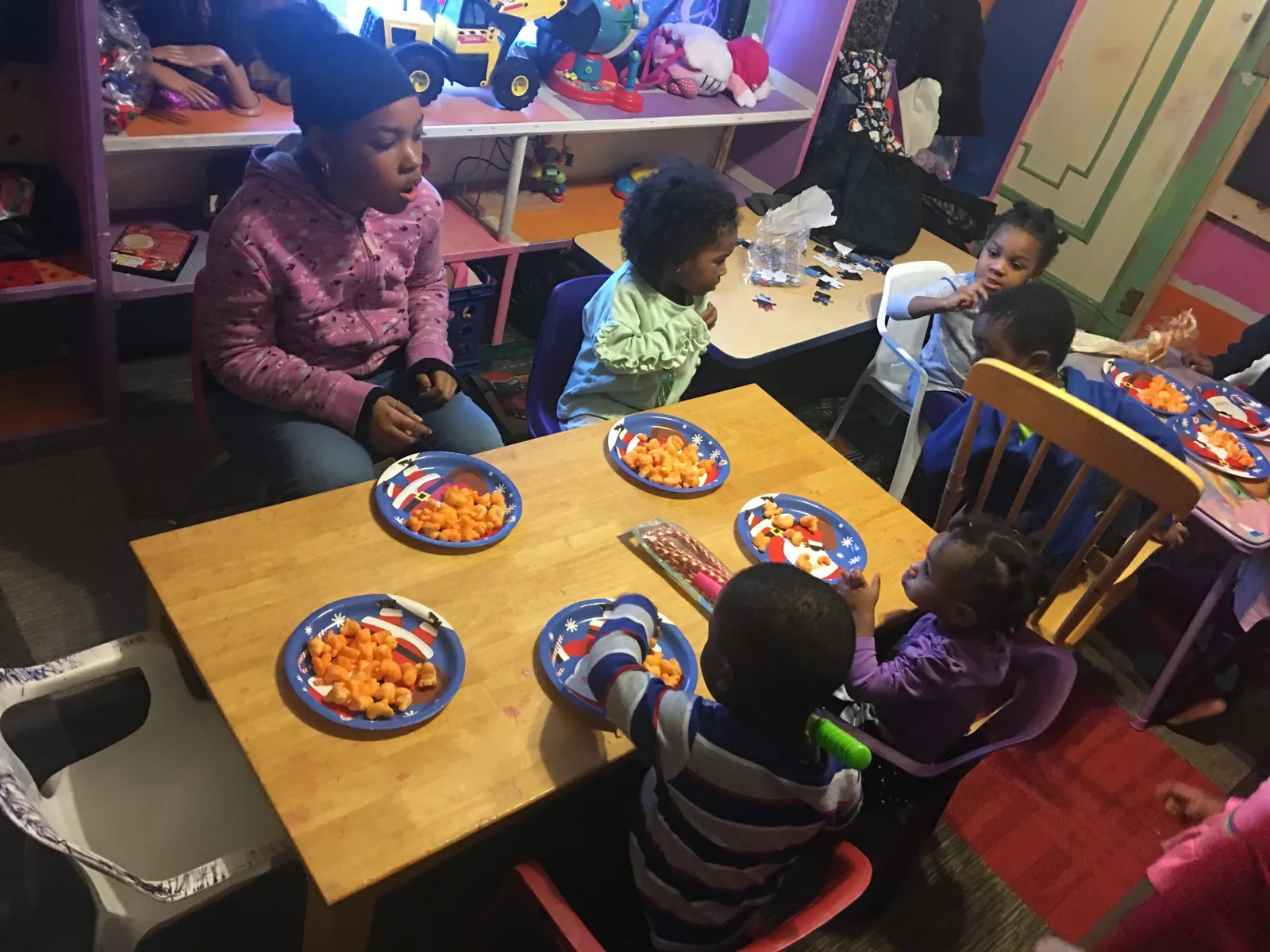 Children seated for snack time