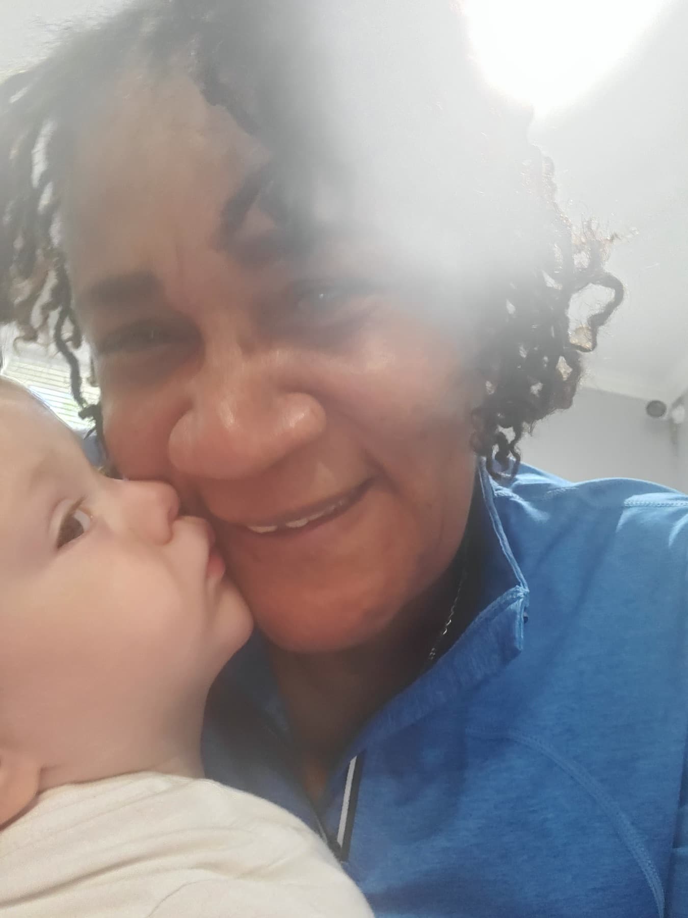 Caregiver sharing a warm moment with a child