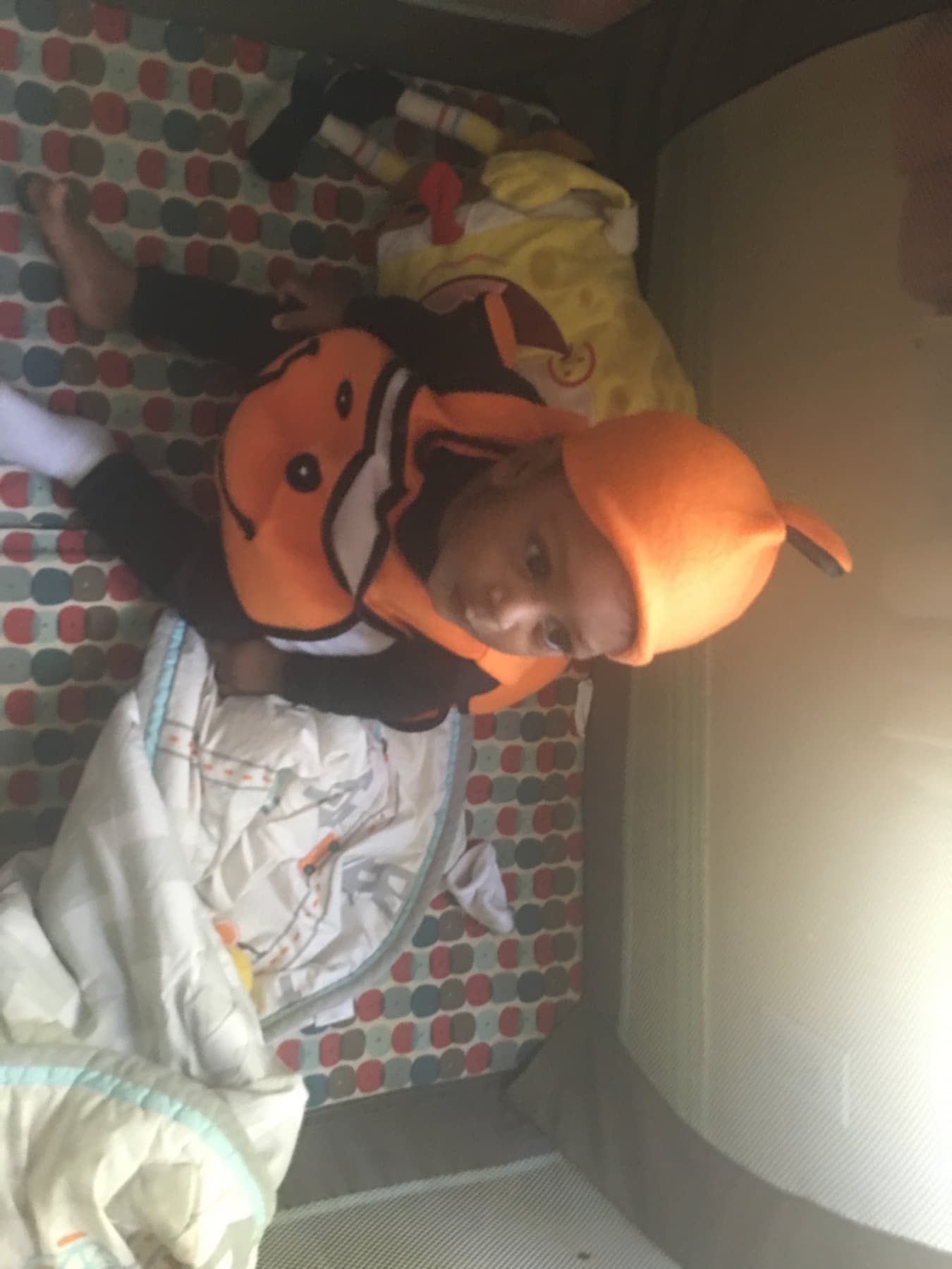 Infant in a costume during a daycare celebration