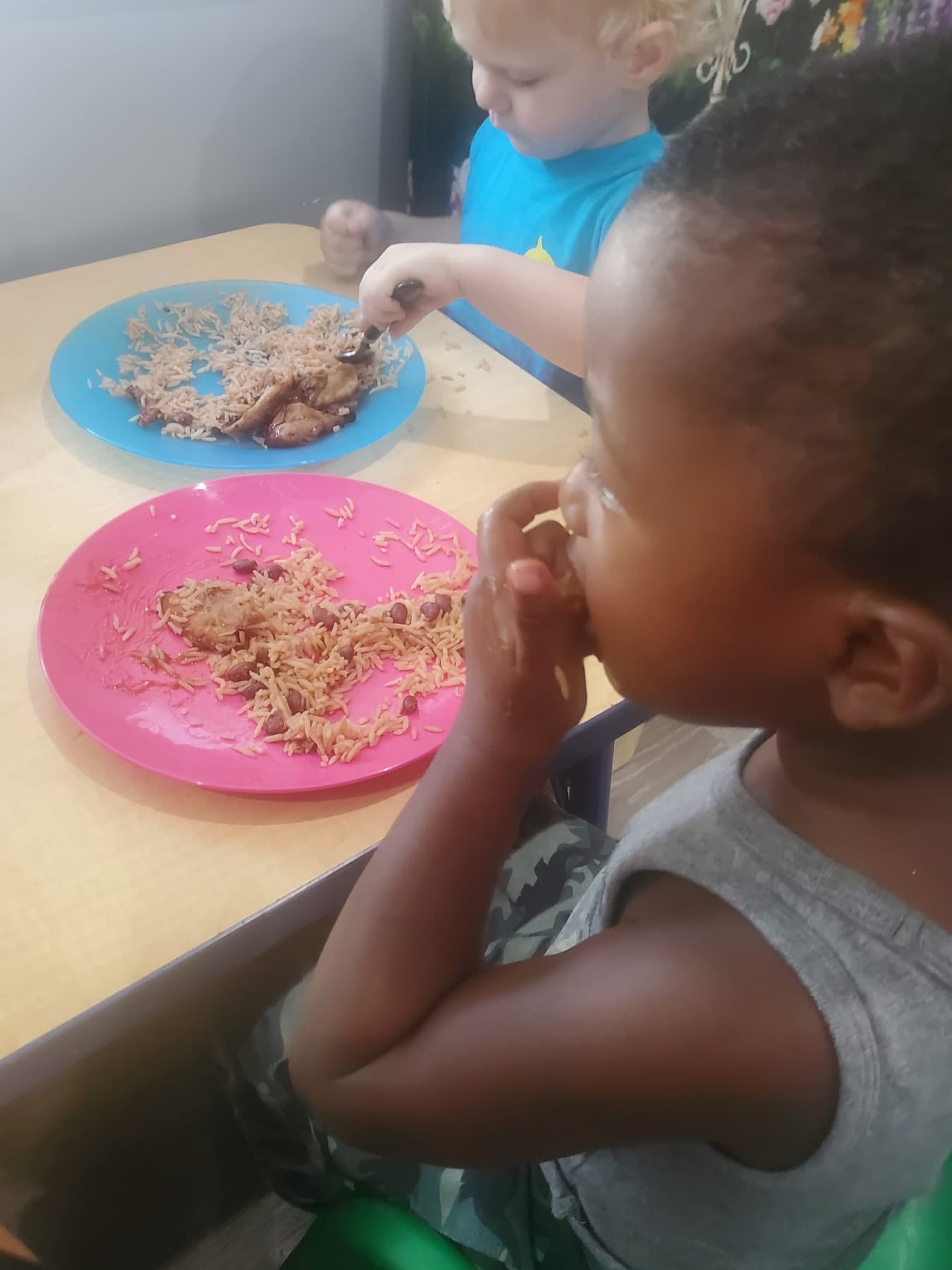 Children seated at the table during lunch