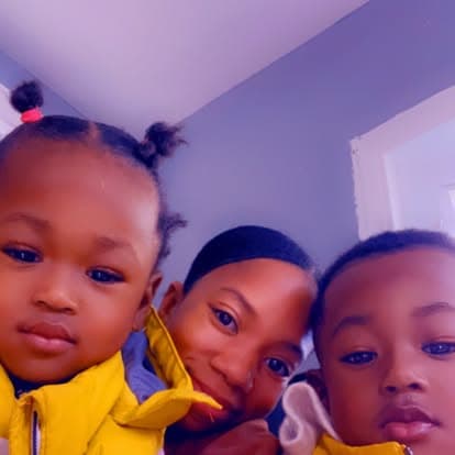 Teacher and children photographed during the daycare day